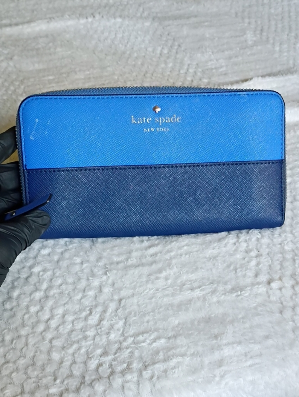 kate spade two-tone blue saffiano zip-around wallet with gold logo